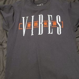 black shirt with white and red lettering, medium